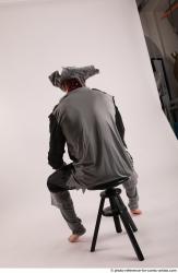 JACK PIRATE SITTING POSE WITH GUN AND DAGGER